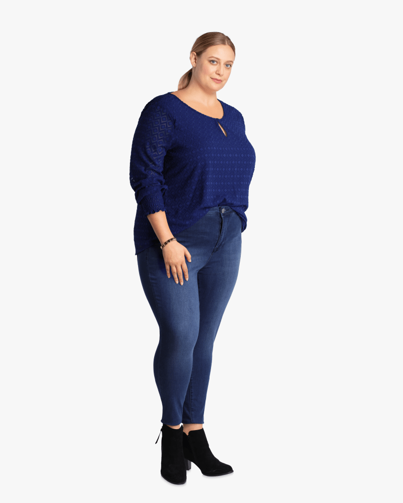 Plus size model with hourglass body shape wearing Sammy Textured Blouse by Ryan Wythe | Dia&Co | dia_product_style_image_id:114244